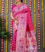 Rani pink banarasi silk blend saree with multicolor floral zari weaving
