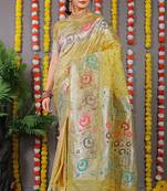 Mustard banarasi silk blend saree with multicolor floral zari weaving