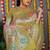 Mustard banarasi silk blend saree with multicolor floral zari weaving