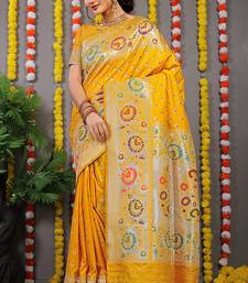 Yellow banarasi silk blend saree with multicolor floral zari weaving