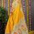 Yellow banarasi silk blend saree with multicolor floral zari weaving