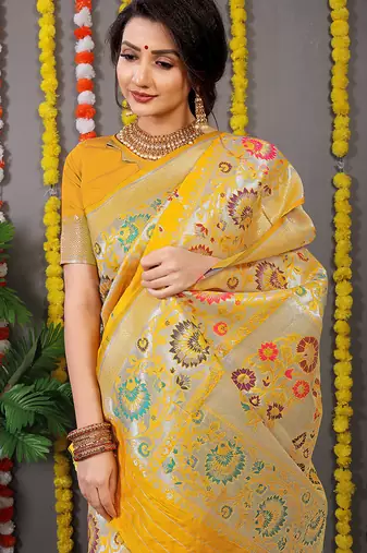 Yellow banarasi silk blend saree with multicolor floral zari weaving