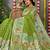 Parrot green banarasi silk blend saree with multicolor floral zari weaving