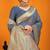Slate grey banarasi silk blend saree with gold zari border & floral buta weaving