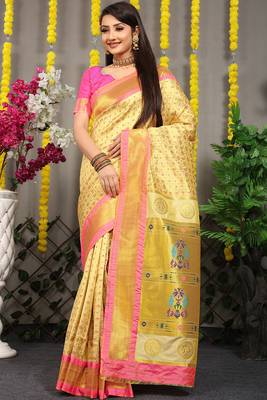 Cream yellow paithani silk blend saree with  pink border and peacock pallu 1