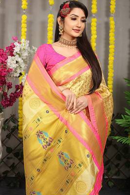 Cream yellow paithani silk blend saree with  pink border and peacock pallu 3