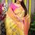 Cream yellow paithani silk blend saree with  pink border and peacock pallu
