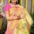 Cream yellow paithani silk blend saree with  pink border and peacock pallu