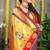 Red paithani silk blend saree with  purple border and peacock pallu