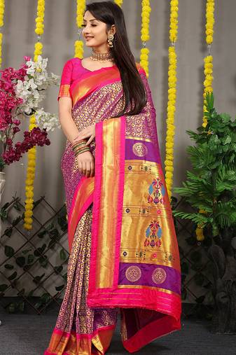 Purple paithani silk blend saree with  rani pink border and peacock pallu