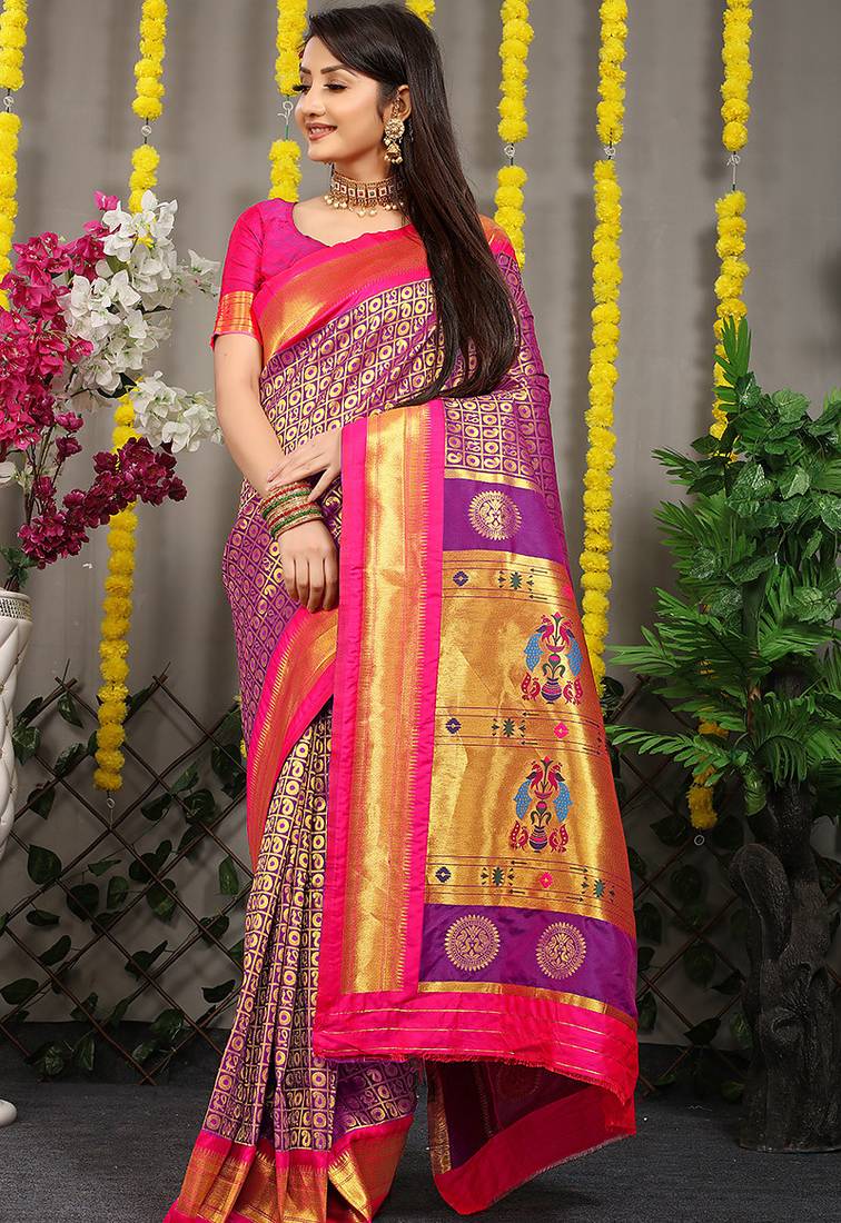 Purple paithani silk blend saree with  rani pink border and peacock pallu