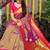 Purple paithani silk blend saree with  rani pink border and peacock pallu
