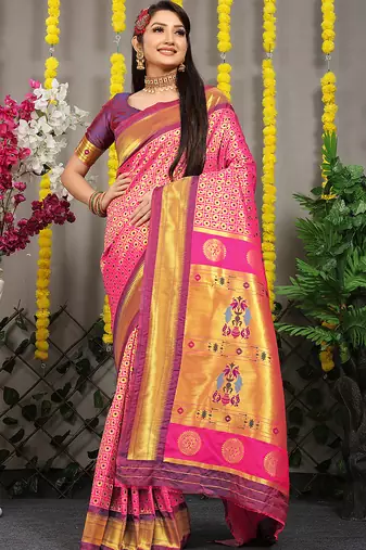 Rani pink paithani silk blend saree with  purple border and peacock pallu