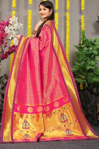 Rani pink paithani silk blend saree with  purple border and peacock pallu