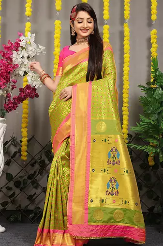 Parrot green paithani silk blend saree with  rani pink border and peacock pallu