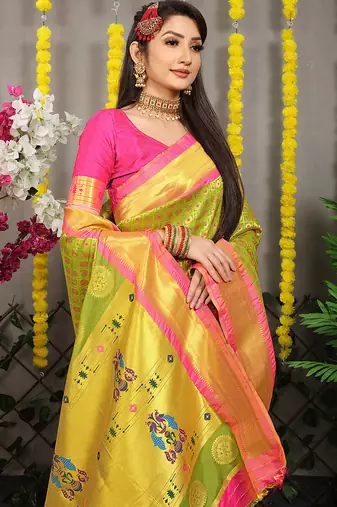 Parrot green paithani silk blend saree with  rani pink border and peacock pallu