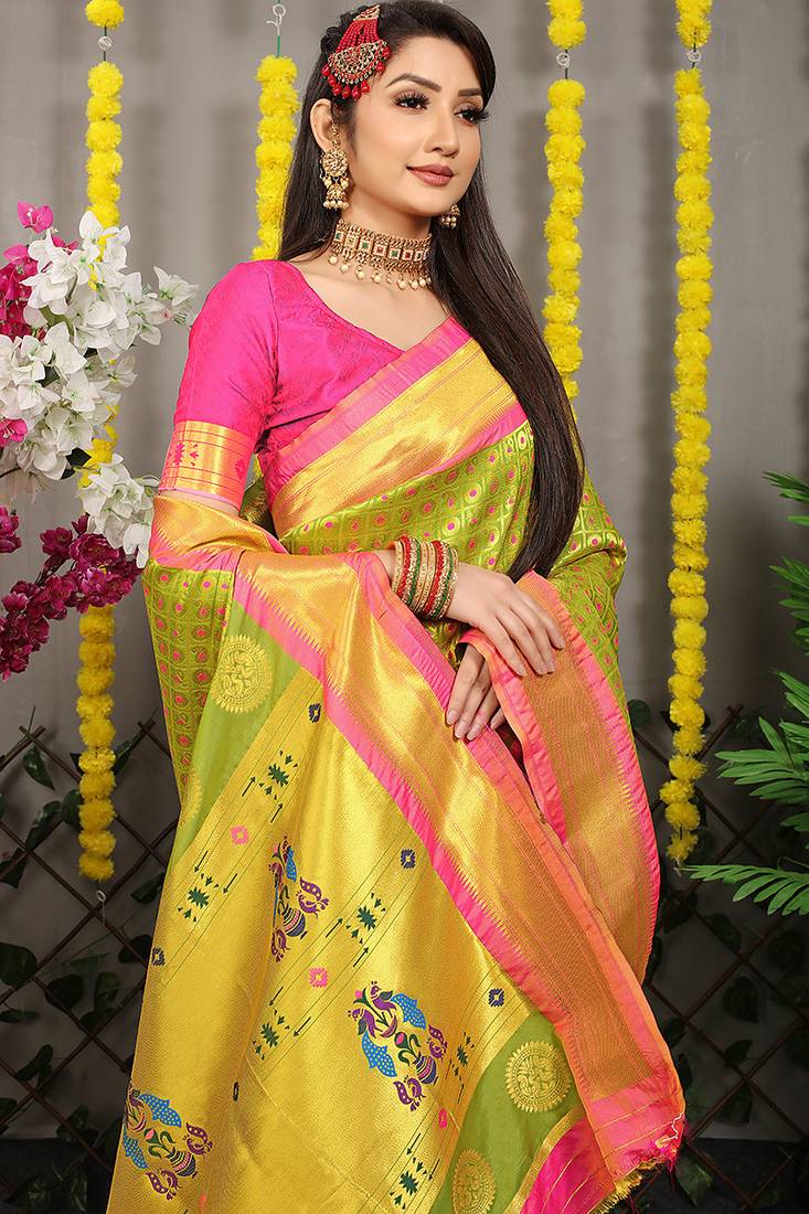 Parrot green paithani silk blend saree with  rani pink border and peacock pallu