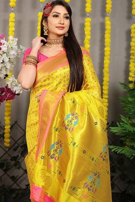 Yellow paithani silk blend saree with  rani pink border and peacock pallu 2