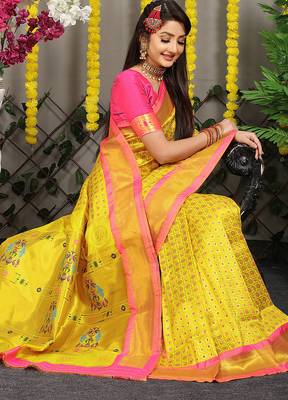 Yellow paithani silk blend saree with  rani pink border and peacock pallu 3