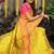 Yellow paithani silk blend saree with  rani pink border and peacock pallu