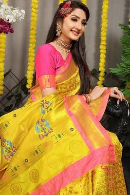 Yellow paithani silk blend saree with  rani pink border and peacock pallu 4