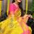 Yellow paithani silk blend saree with  rani pink border and peacock pallu