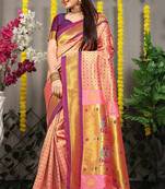 Peach paithani silk blend saree with  purple border and peacock pallu