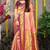 Peach paithani silk blend saree with  purple border and peacock pallu