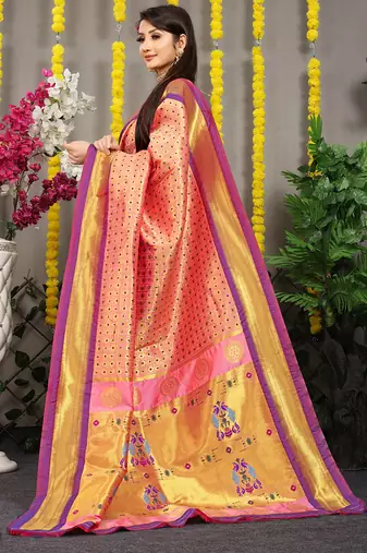 Peach paithani silk blend saree with  purple border and peacock pallu