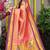 Peach paithani silk blend saree with  purple border and peacock pallu
