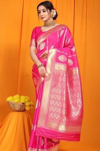 Rani pink banarasi silk blend saree with rich zari border & buttas