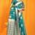 Teal banarasi silk blend saree with rich zari border & buttas