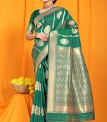 Green banarasi silk blend saree with rich zari border & buttas