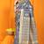 Grey banarasi silk blend saree with rich zari border & buttas