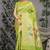 Lime green patola silk blend saree with multicolour floral zari weaving