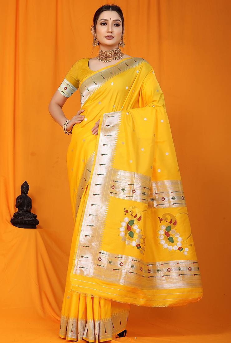 Yellow paithani silk blend saree with silver zari border & peacock pallu