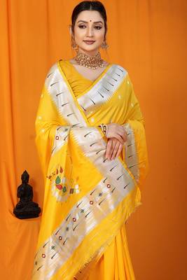 Yellow paithani silk blend saree with silver zari border & peacock pallu 3