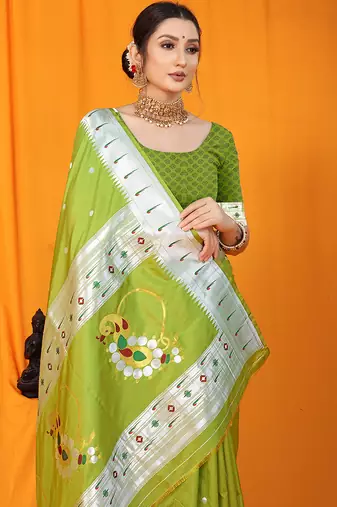 Parrot green paithani silk blend saree with silver zari border & peacock pallu