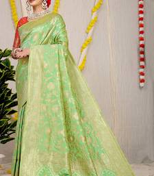 Light green banarasi silk blend saree with all-over floral zari jaal work
