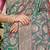 Teal green banarasi silk blend saree with all-over floral zari jaal work