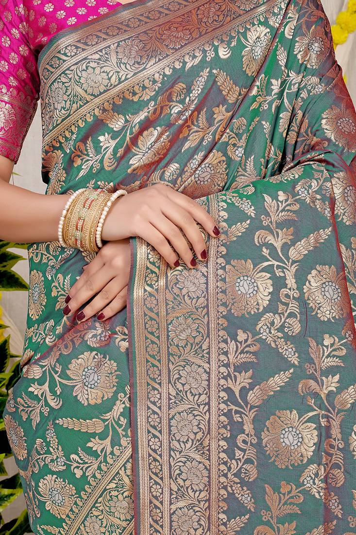 Teal green banarasi silk blend saree with all-over floral zari jaal work
