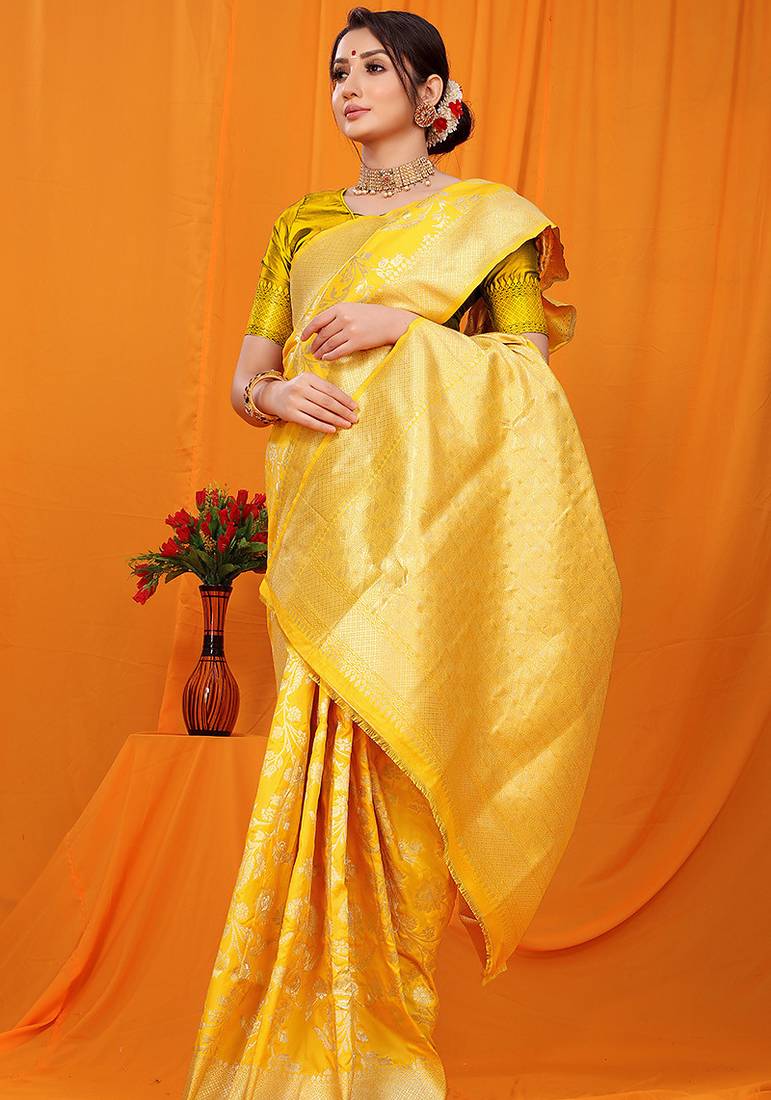Mustard yellow banarasi silk blend saree with rich zari floral weaving