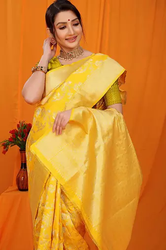 Mustard yellow banarasi silk blend saree with rich zari floral weaving
