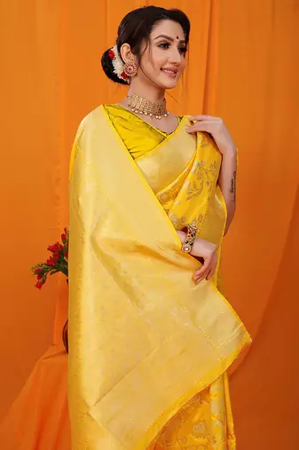 Mustard yellow banarasi silk blend saree with rich zari floral weaving