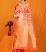 Orange banarasi silk blend saree with rich zari floral weaving