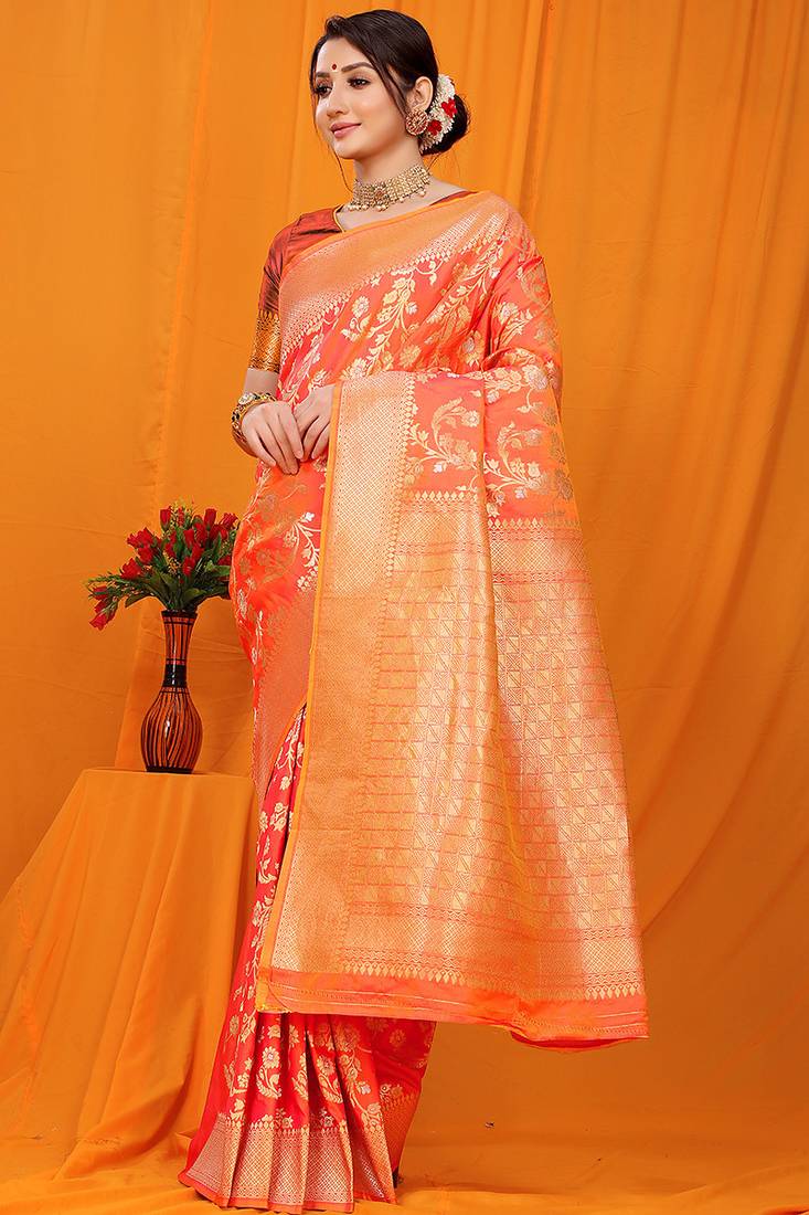Orange banarasi silk blend saree with rich zari floral weaving