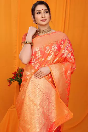 Orange banarasi silk blend saree with rich zari floral weaving