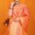 Orange banarasi silk blend saree with rich zari floral weaving