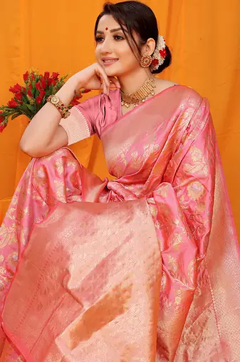 Light pink banarasi silk blend saree with rich zari floral weaving