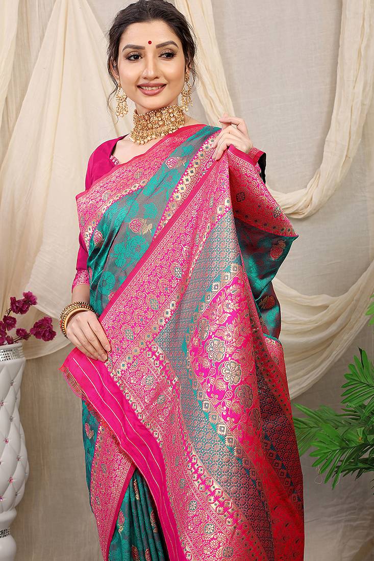 Teal green banarasi silk blend saree with rich zari woven border
